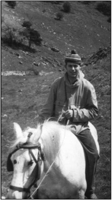 Richard Woollacott riding into camp on the Piney Sleight farm pony  c.1956